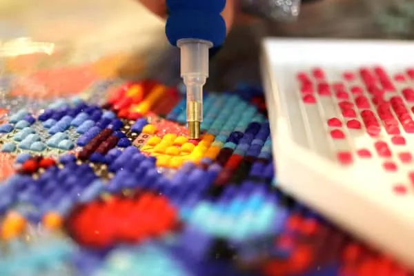 placing diamonds on canvas process